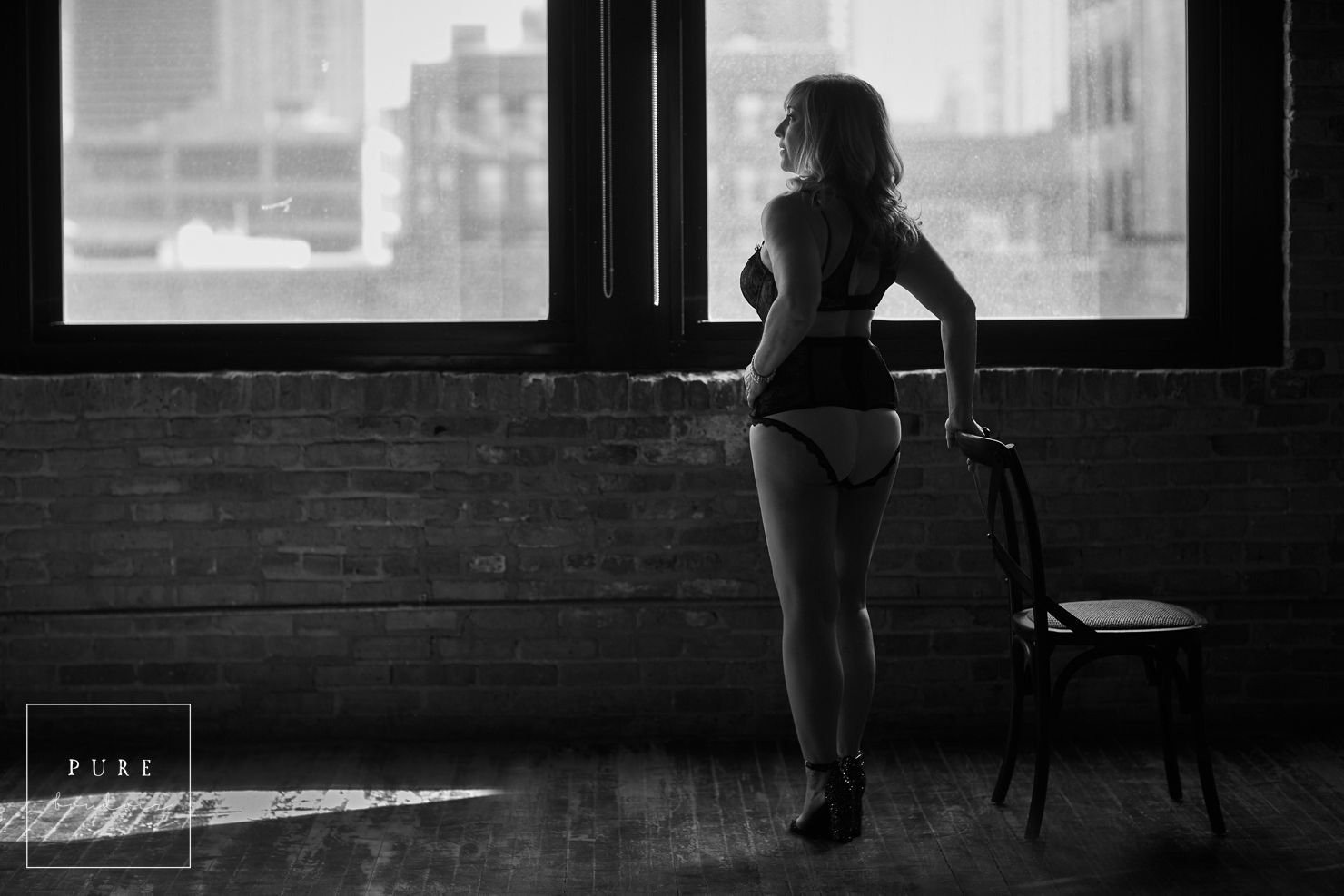 middle age woman and boudoir session with black and white 