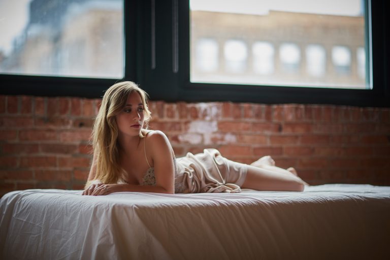 woman laying on bed sexy photography
