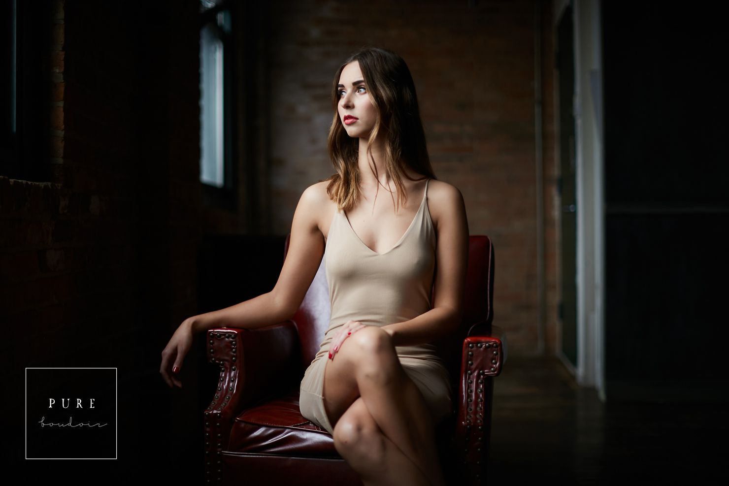 woman sitting on chair wearing lingerie chicago boudoir