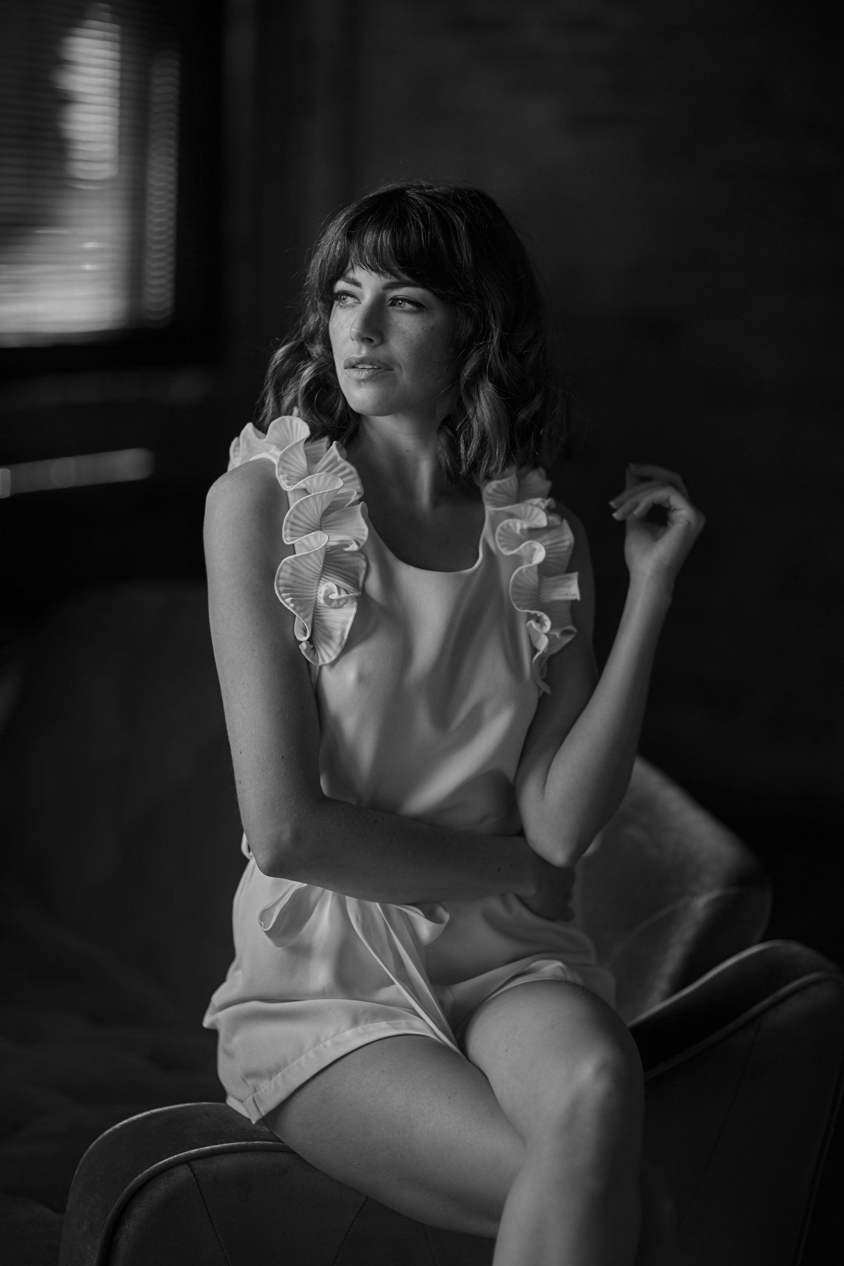 sensual woman sitting in night gown chicago boudoir black and white photography