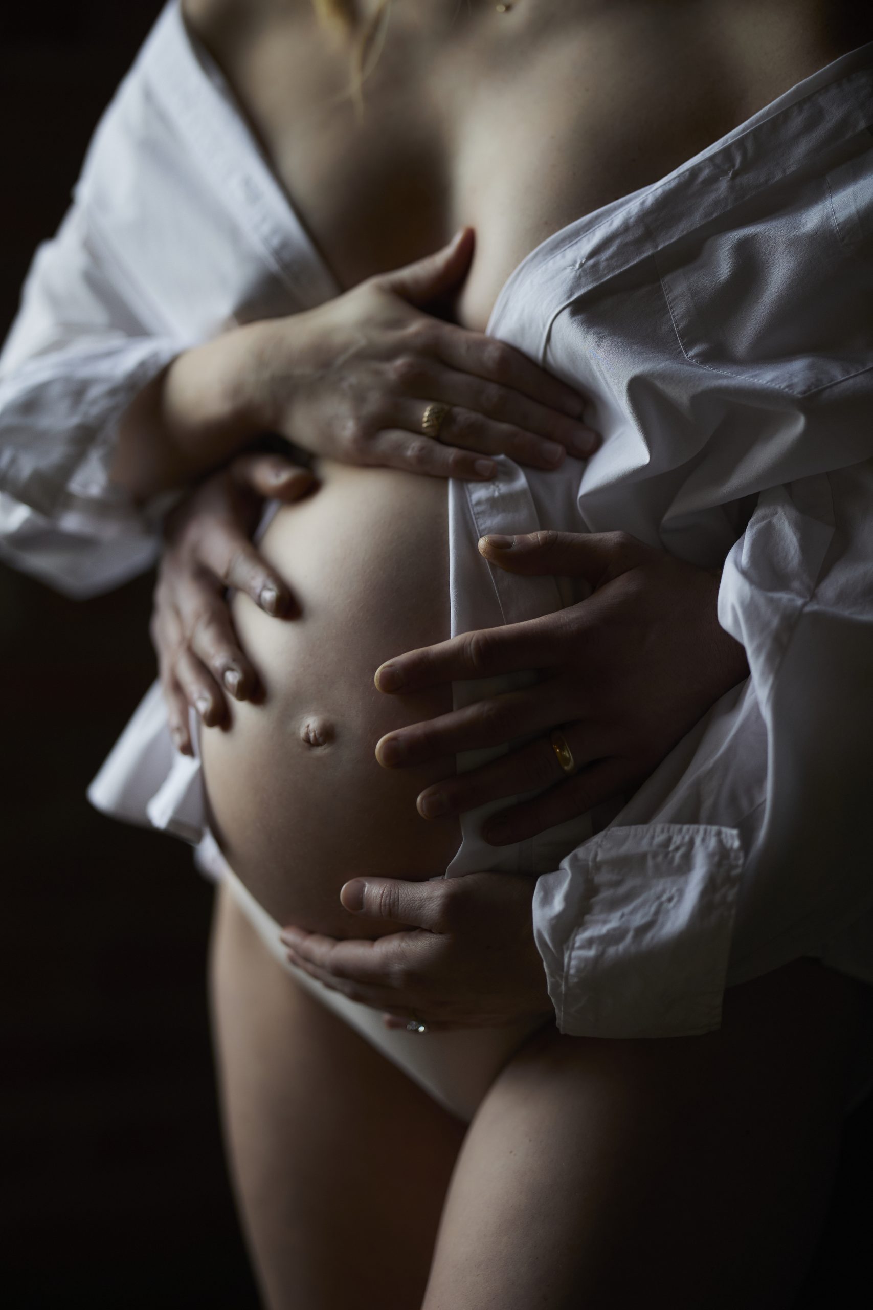 woman in shirt in boudoir maternity photoshoot